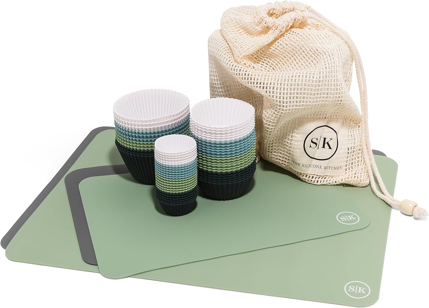 Installing silicone baking cups The Silicone Kitchen reusable gift set on a kitchen countertop